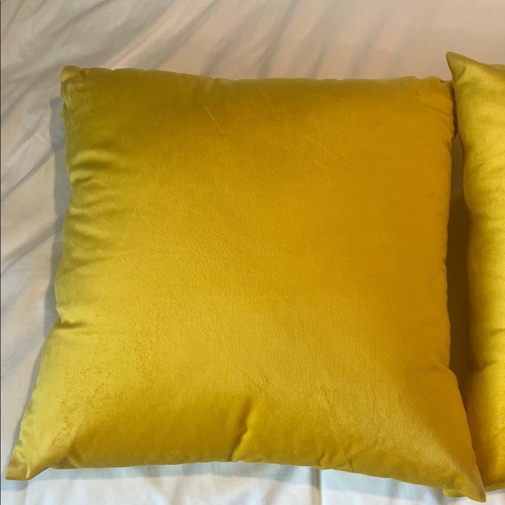 Yellow velvet throw pillow